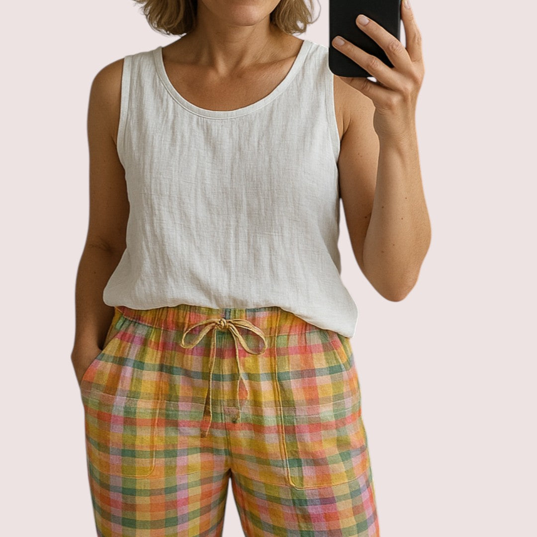 Linnea Stockholm | Rutiga byxor med resår i midjan och rosettknäppning